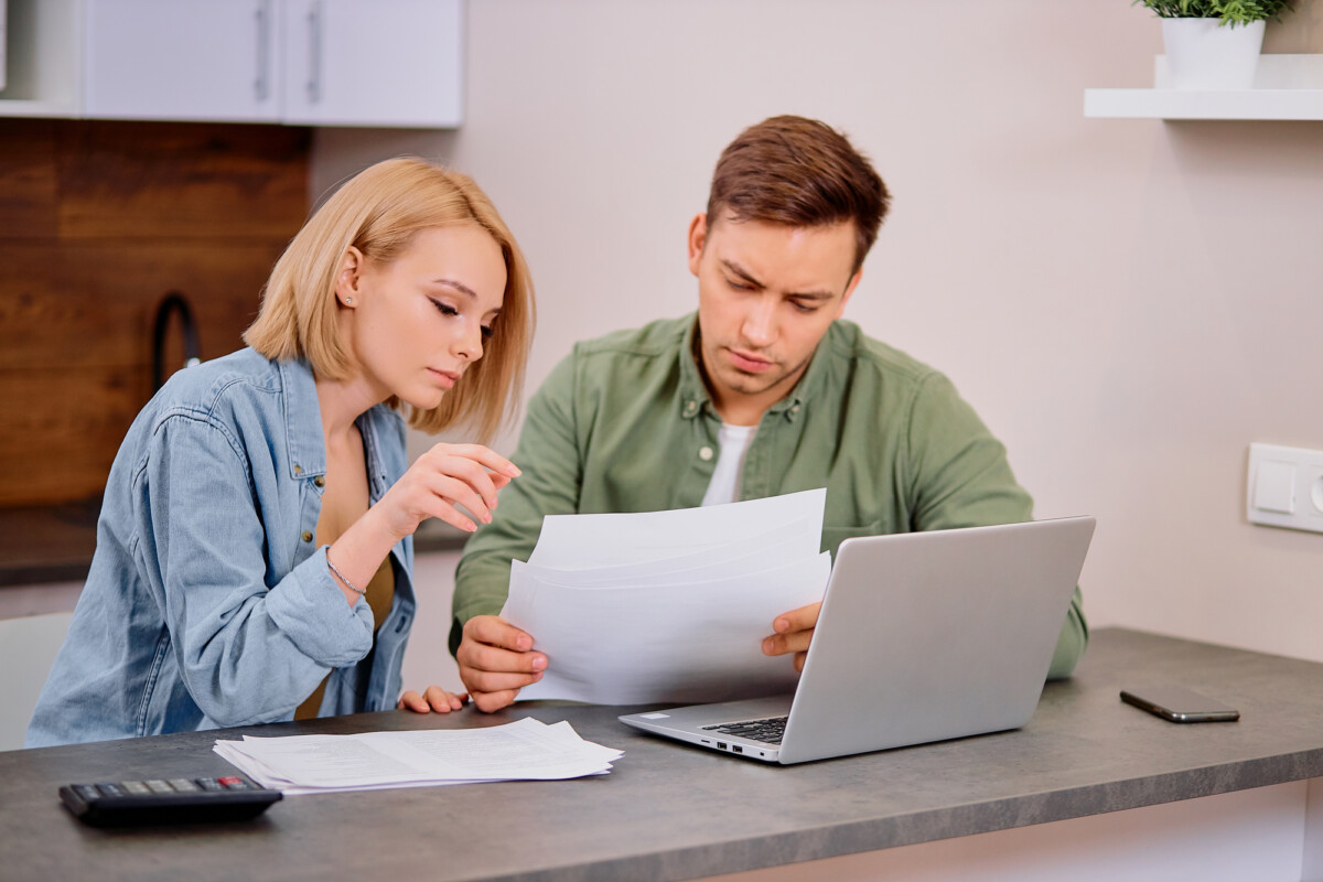 Couple looking over documents.