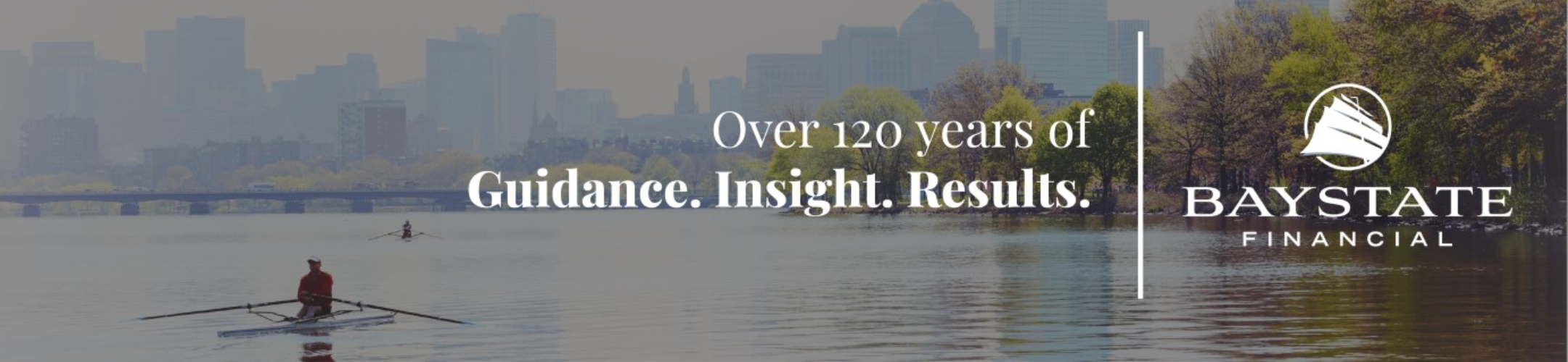 A single rower on a calm river with a city skyline in the background. Text reads: 