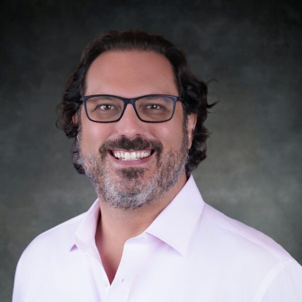 Headshot of Dale Hershman “The Sick Economist”